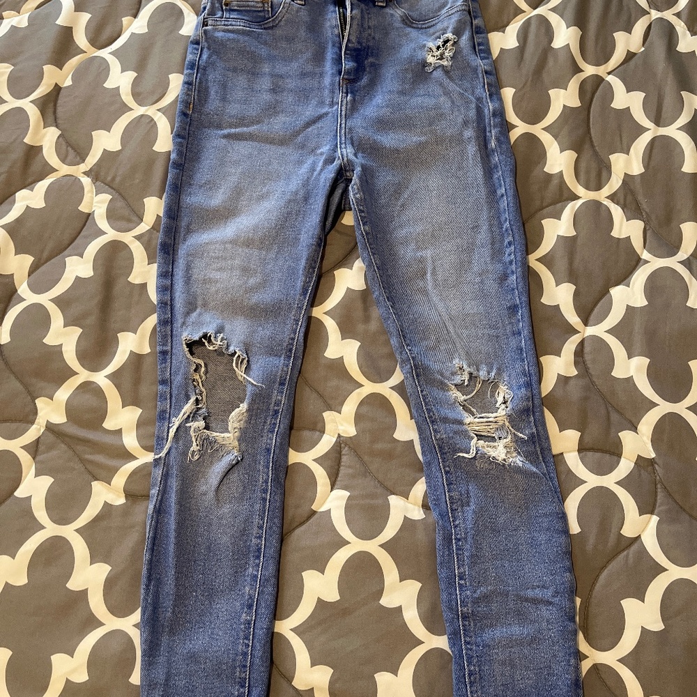 Blue skinny ripped jeans